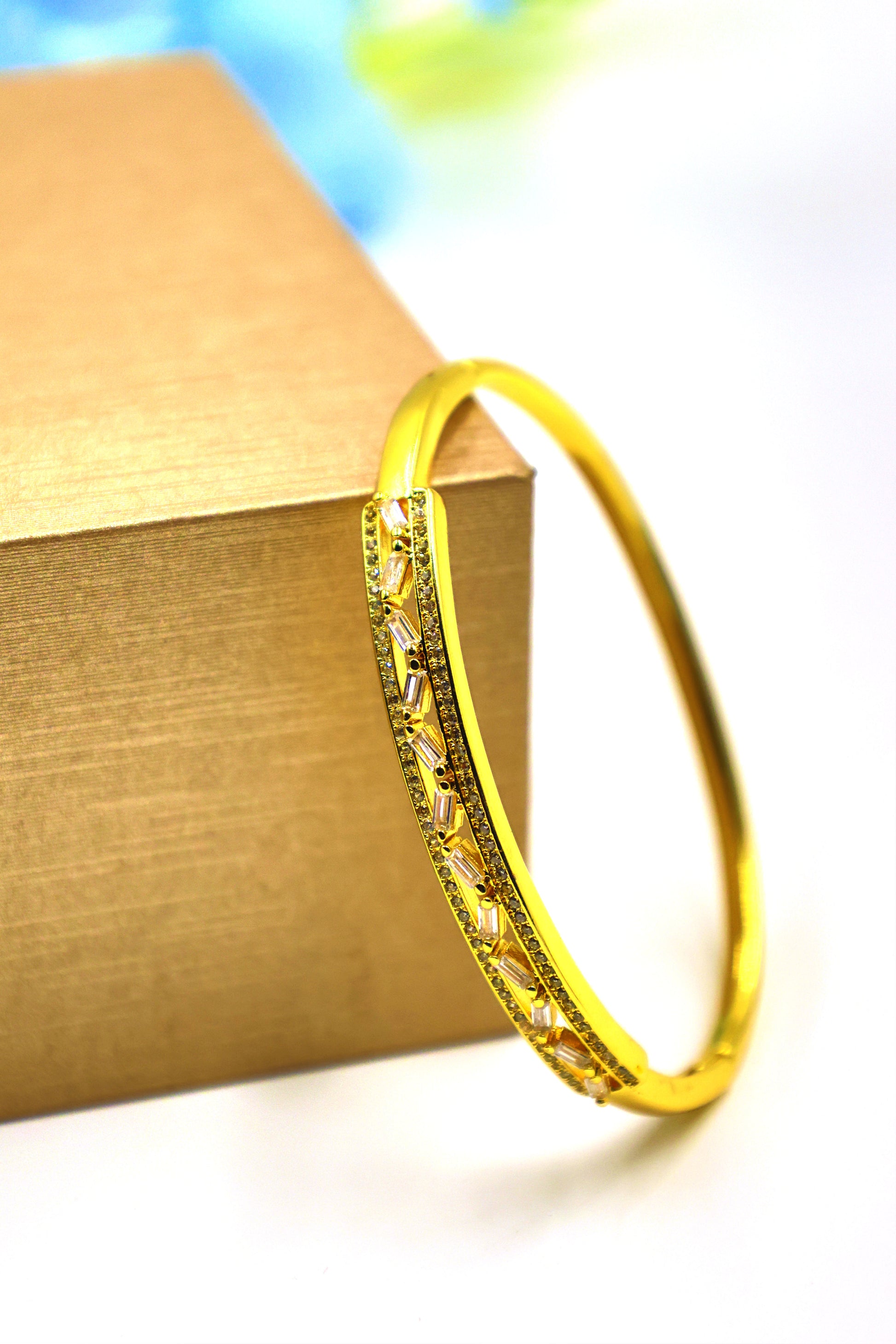 Graceful Prism Cut CZ Gold-Plated 
Material: Brass with premium Gold Plating