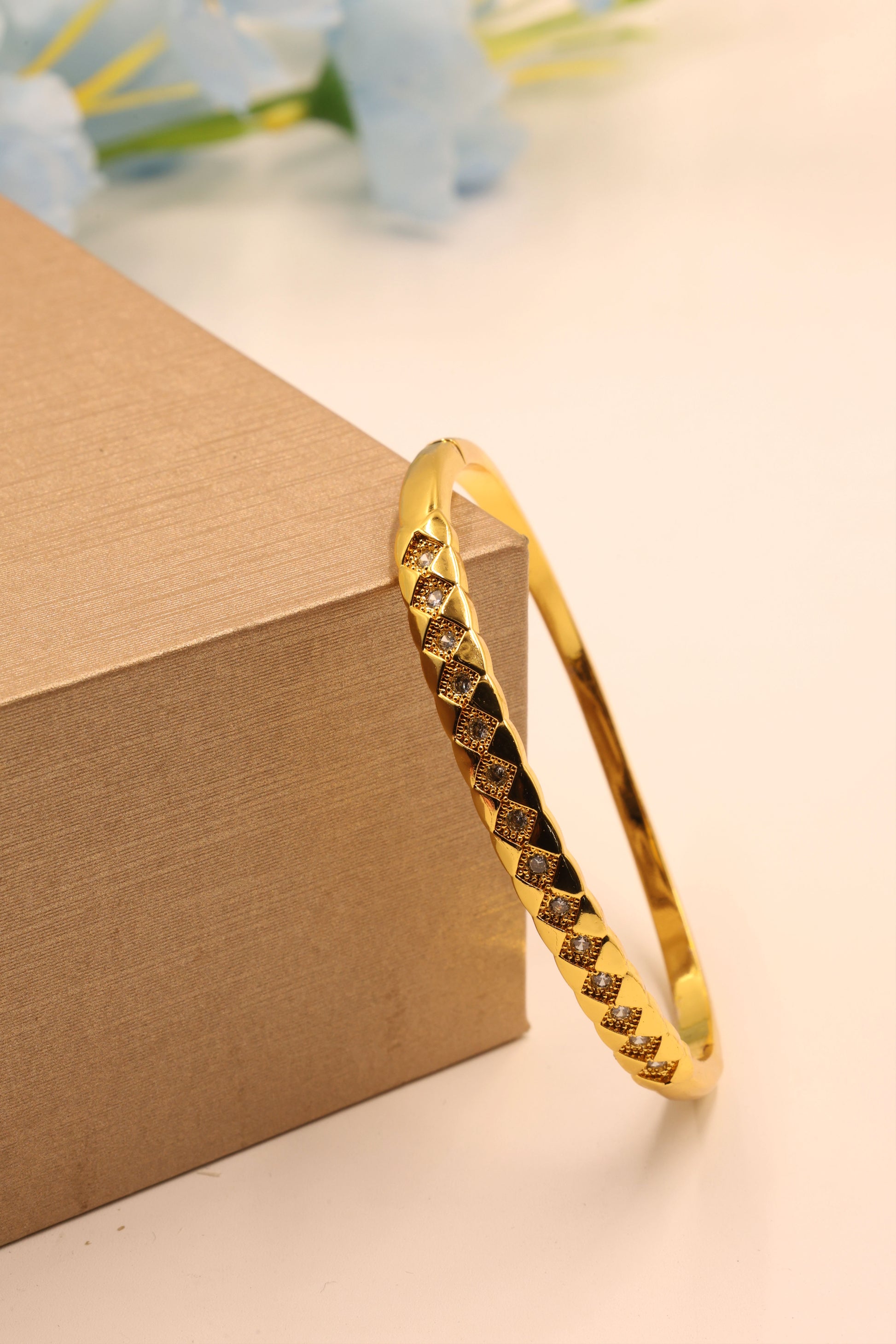 Golden Luxe Diamond-Cut Crisscross CZ Bangle