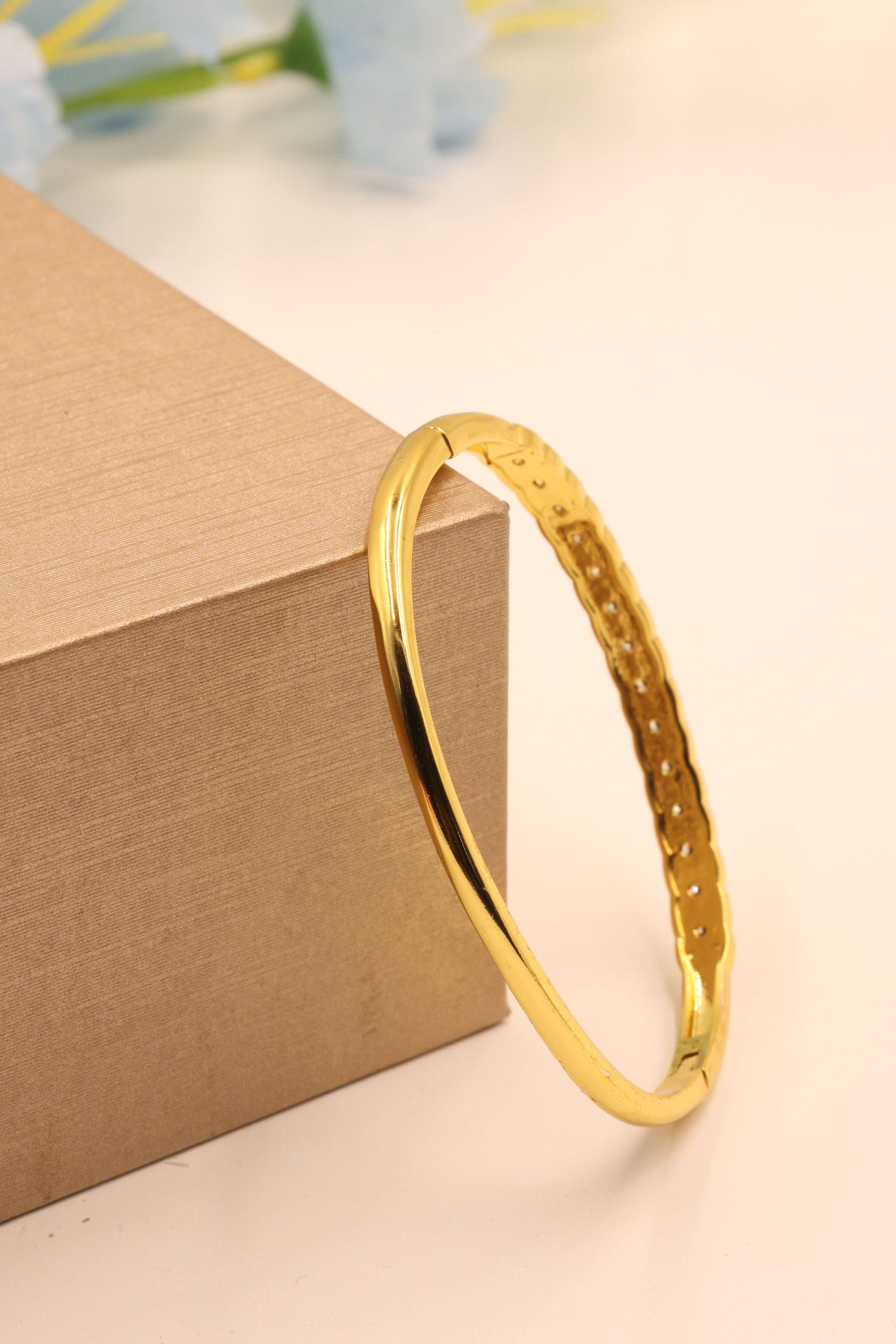 Golden Luxe Diamond-Cut Crisscross CZ Bangle
