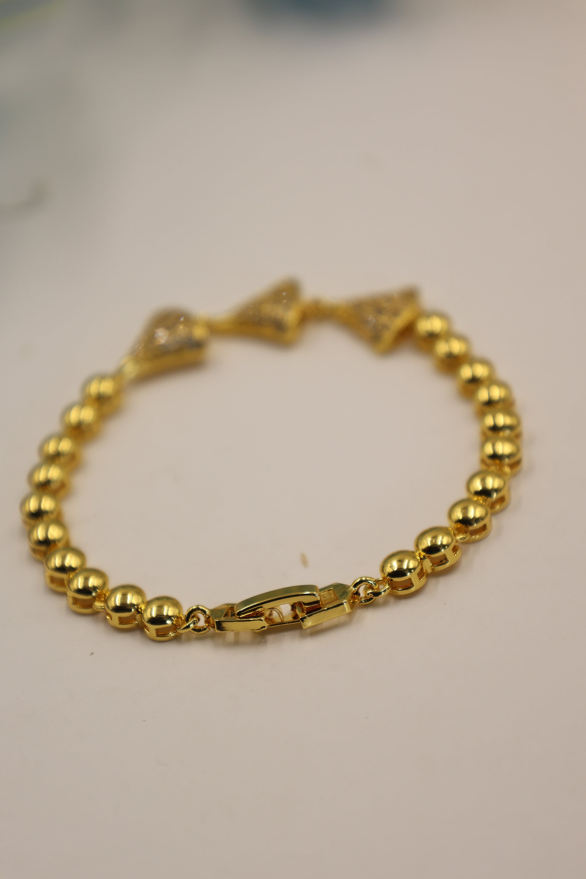 Golden Charm Bell Bracelet with CZ Sparkle