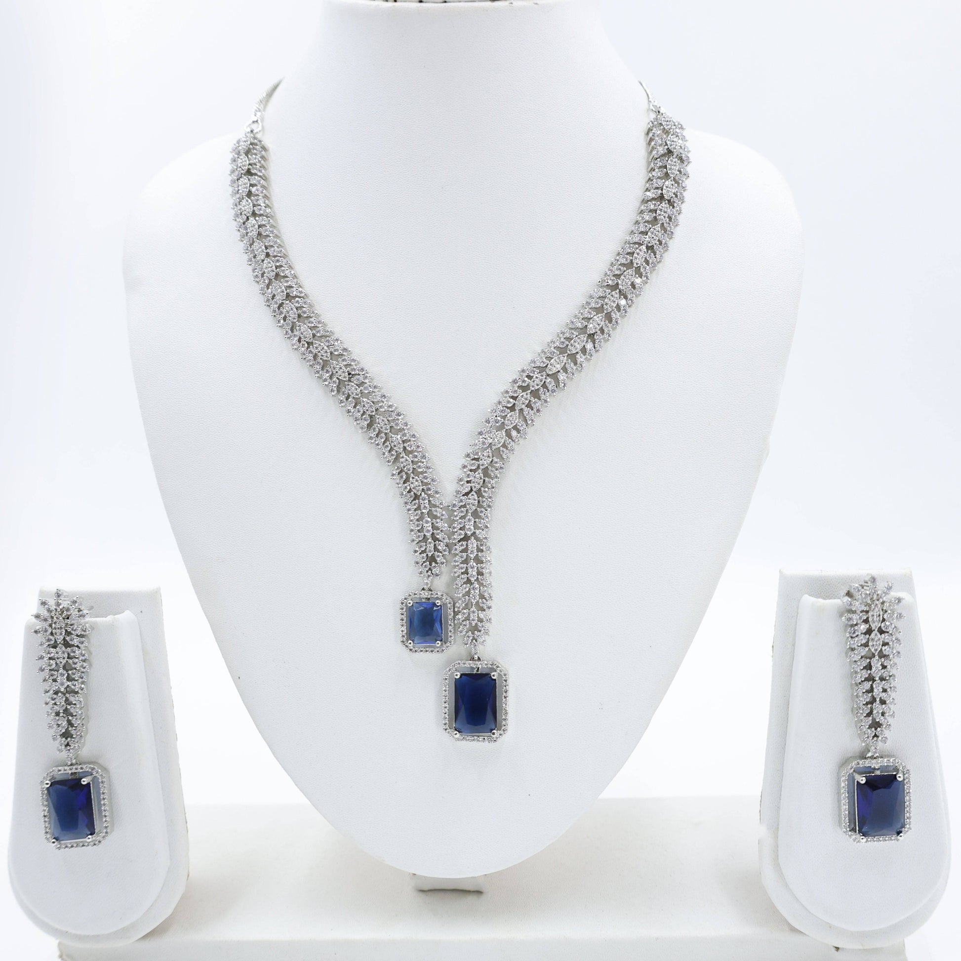 Precious Stone jewelry
American Diamond
Blue Sapphire Jewel Set
Silver Plated AD Bridal Wear
Mywishtree
Necklace and Earing Set