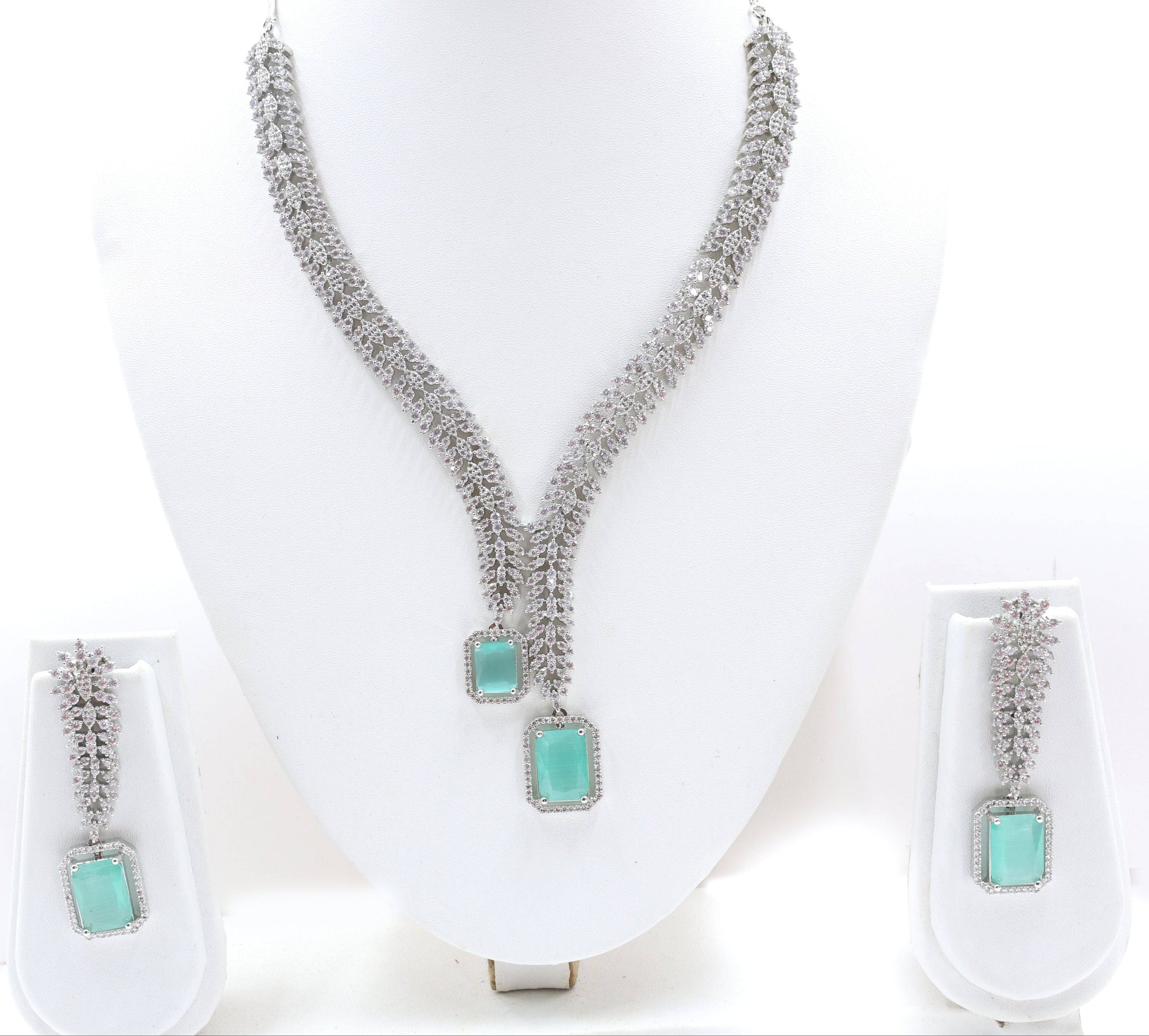 Turquoise Blue Stone American Diamond
Mywishtree
Jewelry Set
Shining Silver-plated jewelry
Diamond Necklace