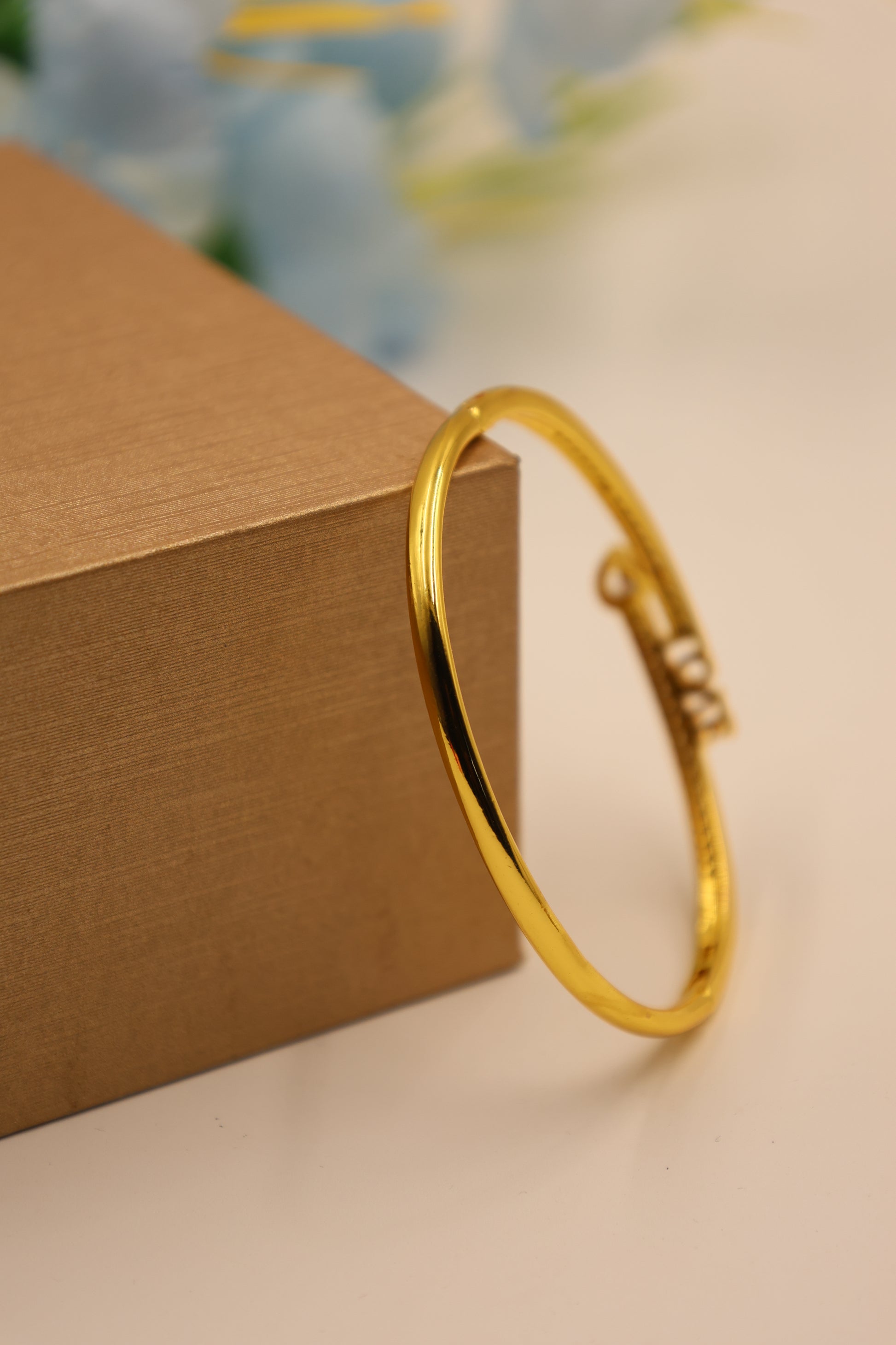 Eternal Love CZ-Studded Gold Bangle with Heart Charm