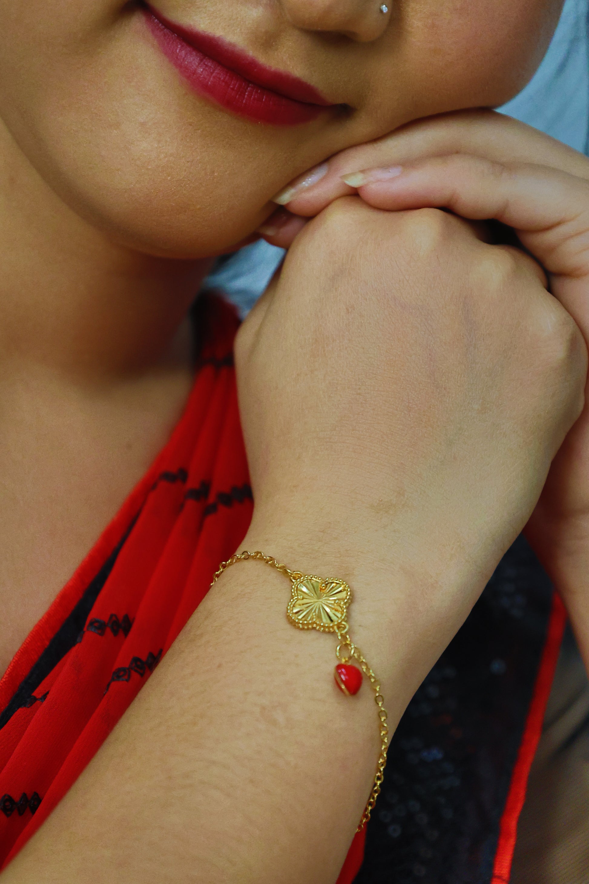 Golden Clover Link Bracelet with Red Charm Drop – Everyday Elegance Edition